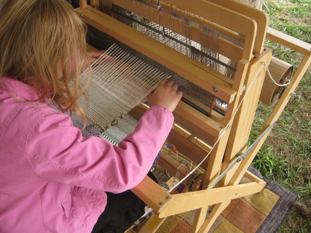 demos-child-at-loom-2